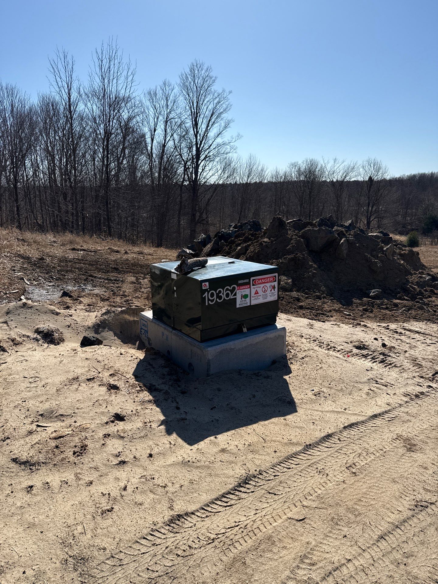Rural transformer and service equipment on concrete pad