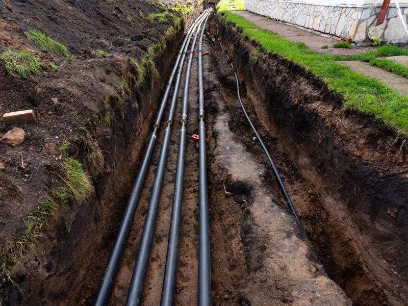 Underground conduit trenching for private power line infrastructure
